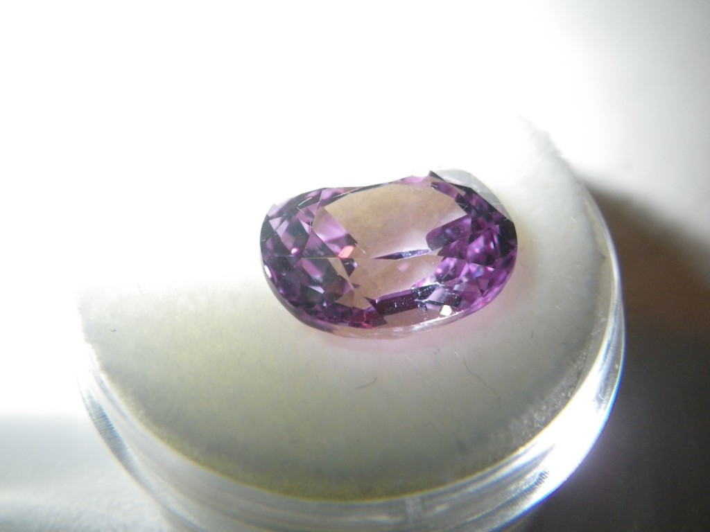An 8.53ct oval cut Brazilian Alexandrite that is part of the Noosphere Geologic Collection